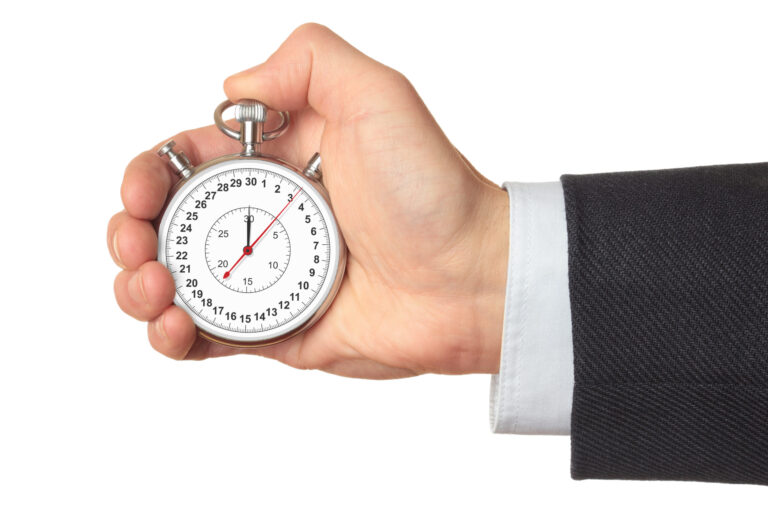 tracking indirect time in timesheet with indirect cost pools- man's hand in suit sleeve with stopwatch